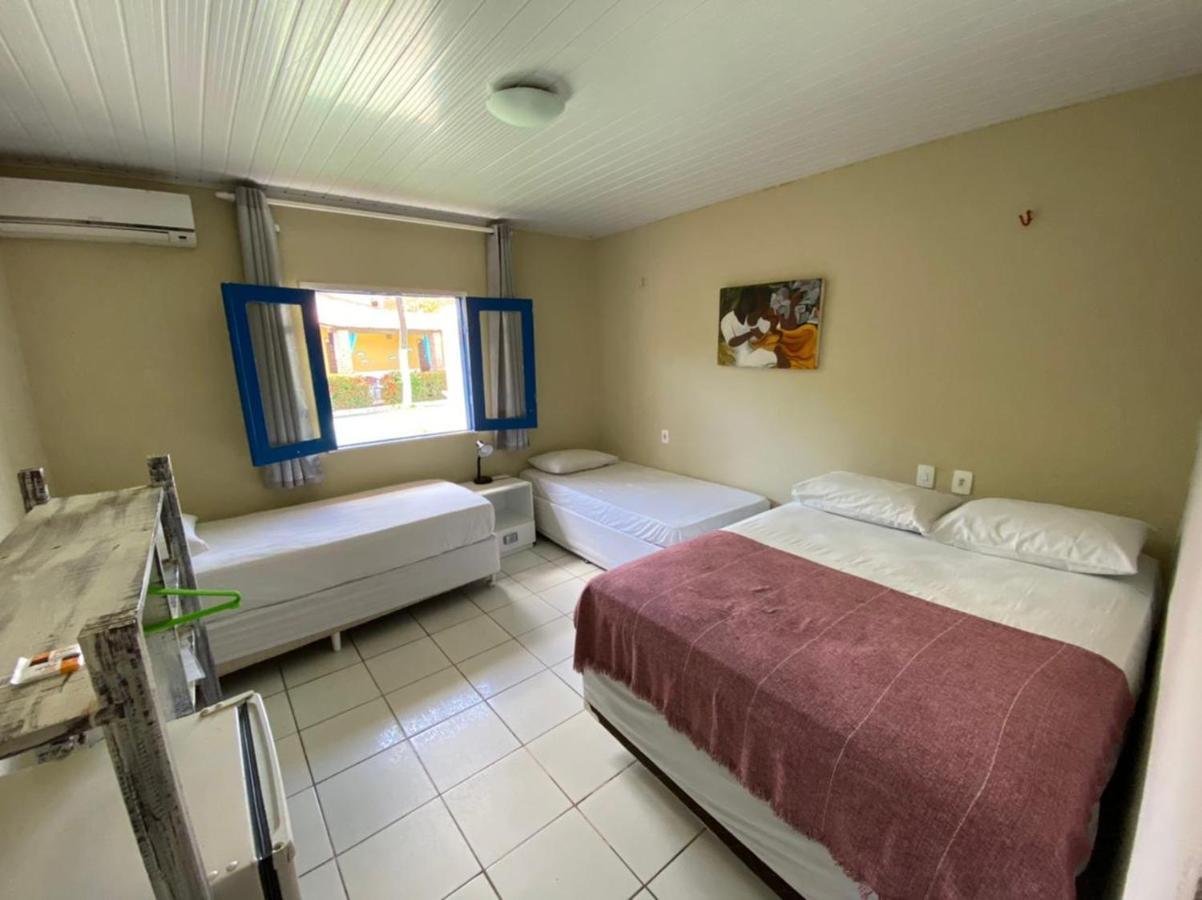 Quarto Triplo com Vista para a Piscina